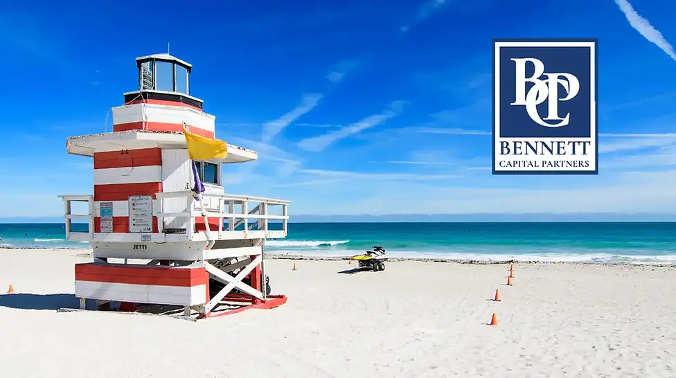 Miami Beach sand, ocean and a colorful lifeguard tower