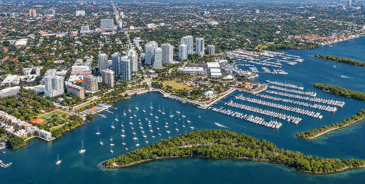 Aerial view of Coconut Grove waterfront buildings, marinas and Biscayne Bay