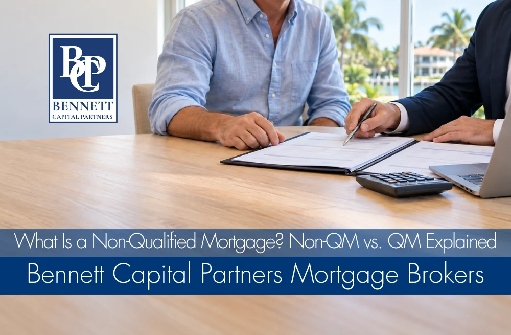 Borrower and mortgage professional reviewing documents for a non-qualified mortgage.